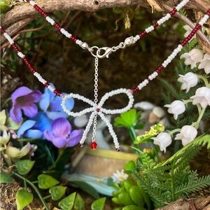 Chic Red and White Beaded Bow Necklace